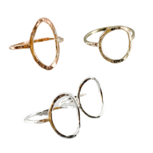 Load image into Gallery viewer, three rings on a white background. leaf shaped ring in the upper left, circle shaped ring in the upper right and two oval shaped rings on the bottom.