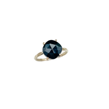 Load image into Gallery viewer, black spinel ring with a gold setting sitting upright on a white background
