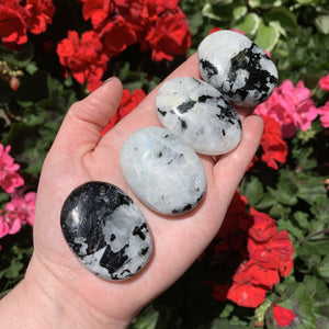 moonstone with black tourmaline palm stones
